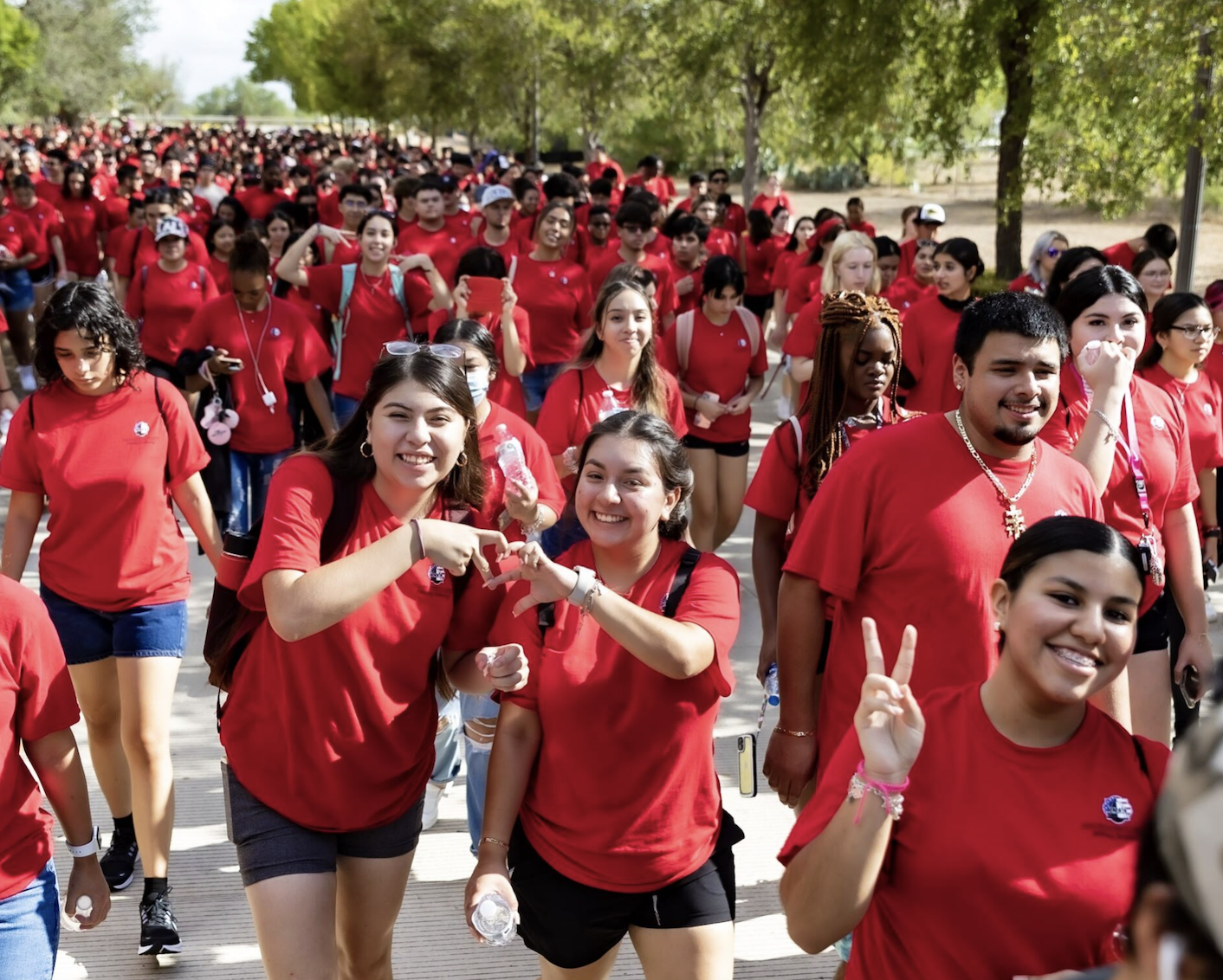 Incoming freshman march the miracle mile.