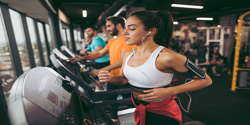 People Running on Treadmills