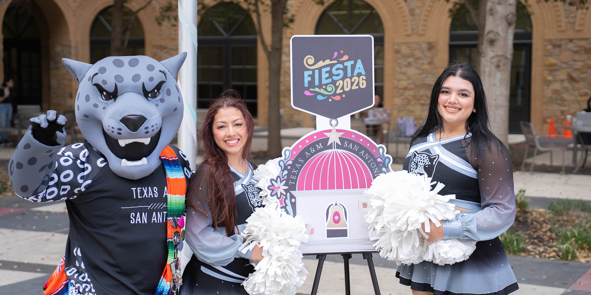General and Cheerleaders with Fiesta Medal