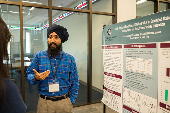 Male Professor Presenting Poster