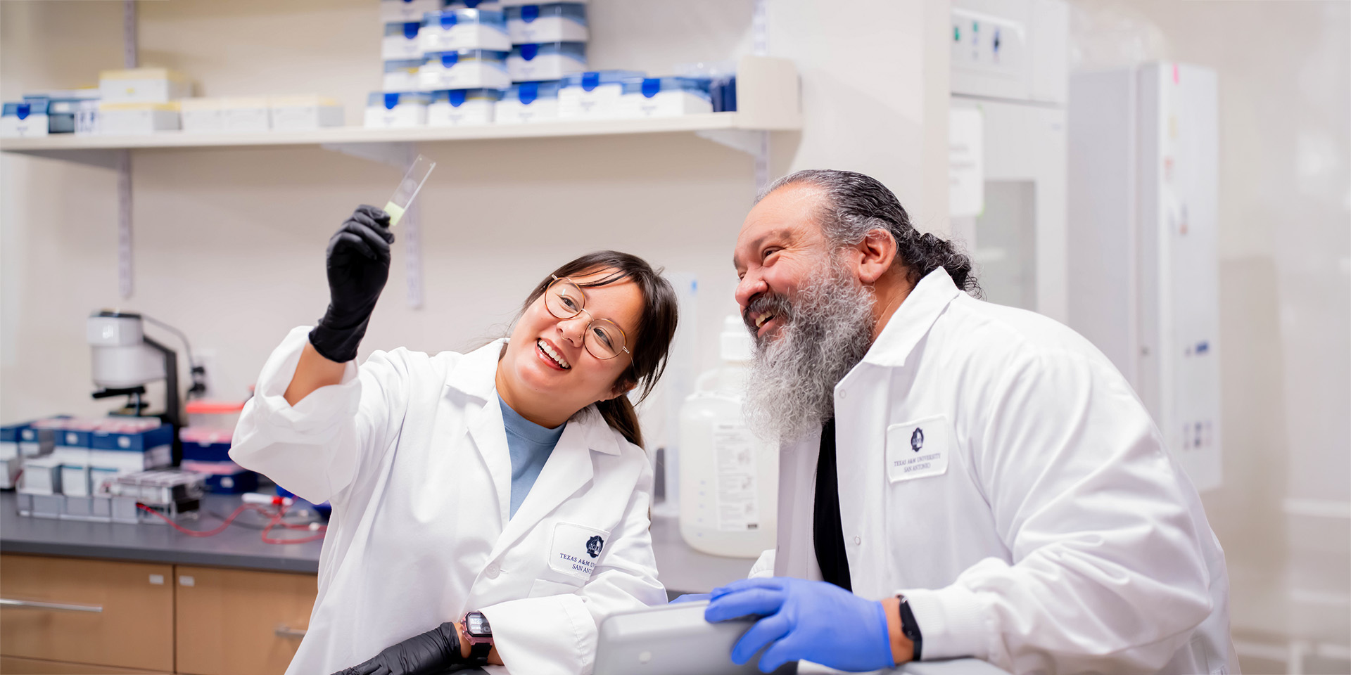 Professor and Student in Lab