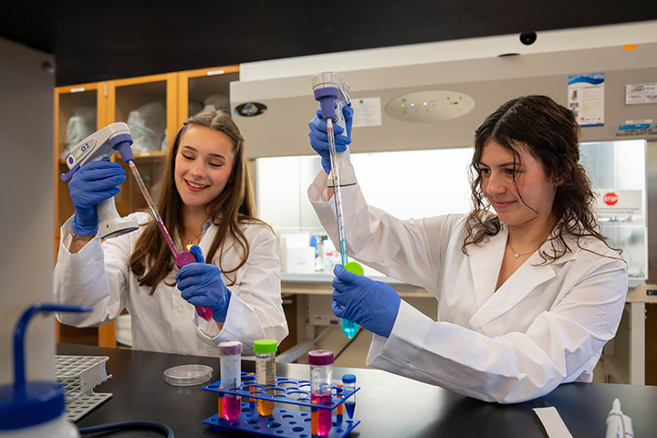 Students in Labcoats in Lab